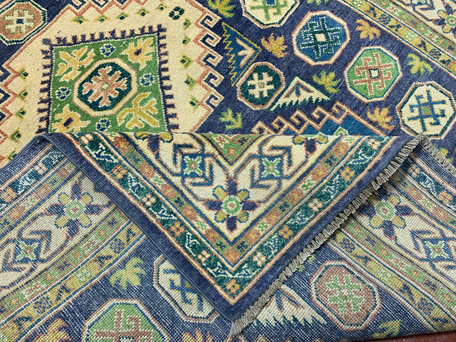 4'11" × 6'10" Hand-Knotted Wool Rug – Navy & Green Geometric Tribal Design