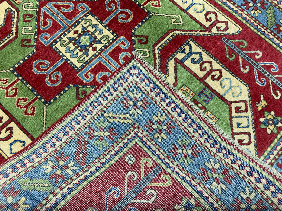 4'10" × 6'7" Hand-Knotted Kazak Wool Rug – Red, Green & Blue Geometric Tribal Design