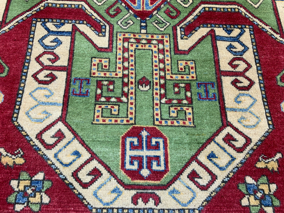 4'10" × 6'7" Hand-Knotted Kazak Wool Rug – Red, Green & Blue Geometric Tribal Design