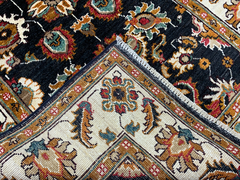 3'11" × 5'10" Hand-Knotted Wool Rug – Black Field with Ivory Border & Floral Design