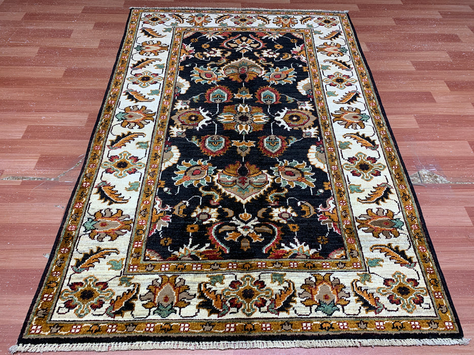 3'11" × 5'10" Hand-Knotted Wool Rug – Black Field with Ivory Border & Floral Design