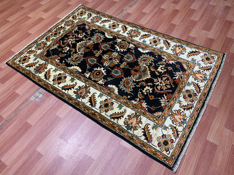 3'11" × 5'10" Hand-Knotted Wool Rug – Black Field with Ivory Border & Floral Design