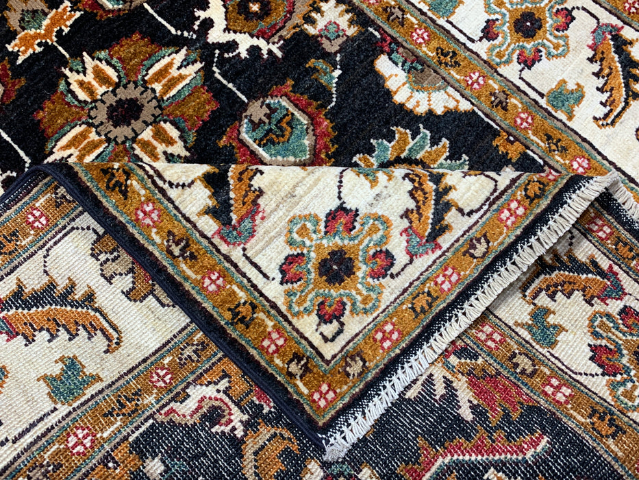 3'11" × 5'10" Hand-Knotted Wool Rug – Black Field with Ivory Border & Floral Design