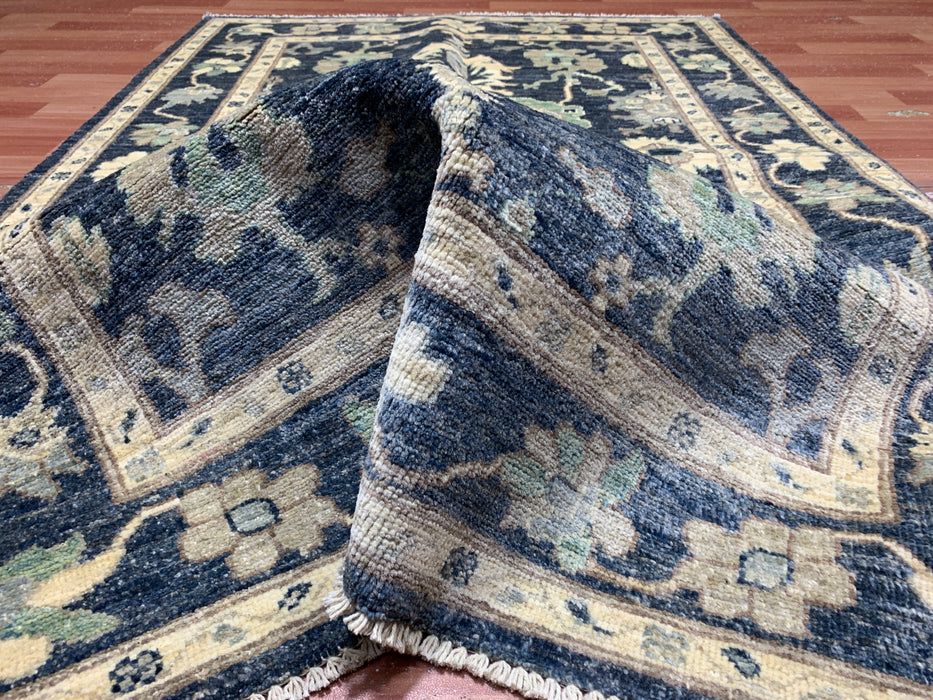 3'11" × 5'10" Hand-Knotted Wool Rug – Black with Floral Motifs