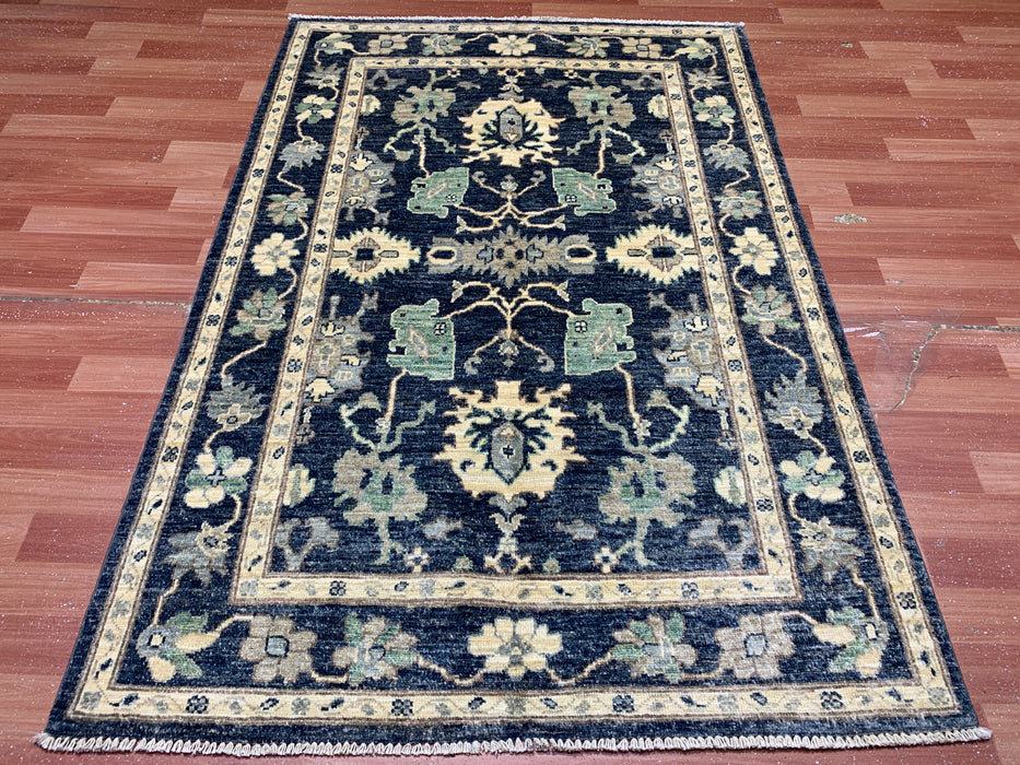 3'11" × 5'10" Hand-Knotted Wool Rug – Black with Floral Motifs