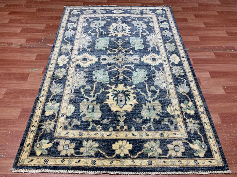 3'11" × 5'10" Hand-Knotted Wool Rug – Black with Floral Motifs