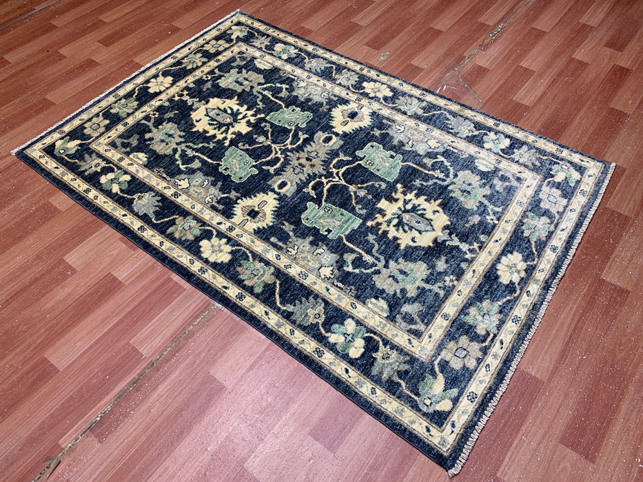3'11" × 5'10" Hand-Knotted Wool Rug – Black with Floral Motifs