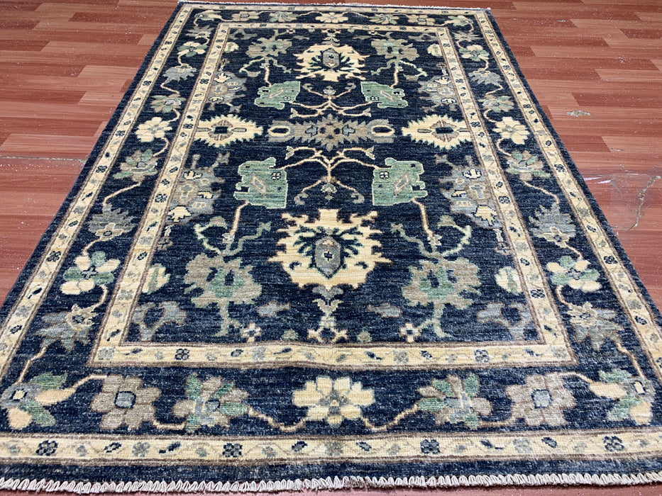3'11" × 5'10" Hand-Knotted Wool Rug – Black with Floral Motifs
