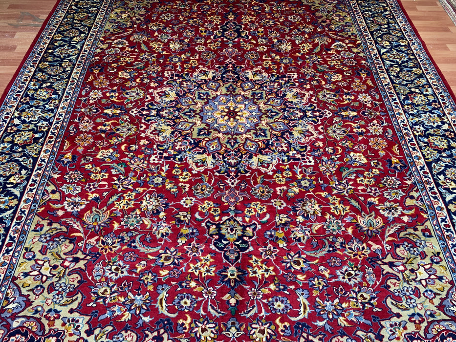 9'10" × 13'1" Hand-Knotted Wool Rug – Persian Red with Navy Floral Border