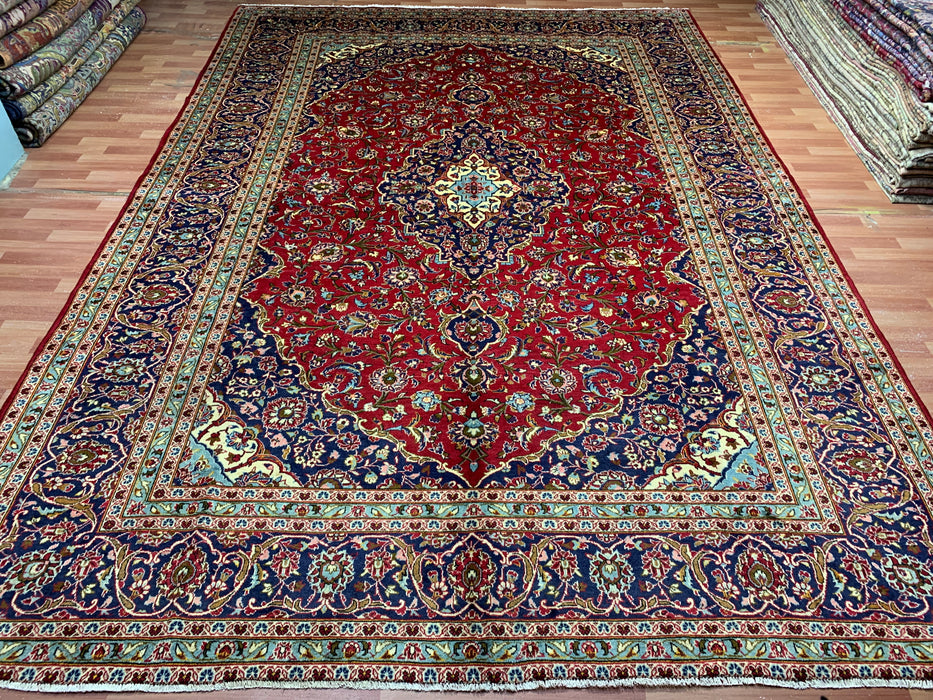 10'0" × 14'4" Hand-Knotted Wool Rug – Red Medallion with Navy Border