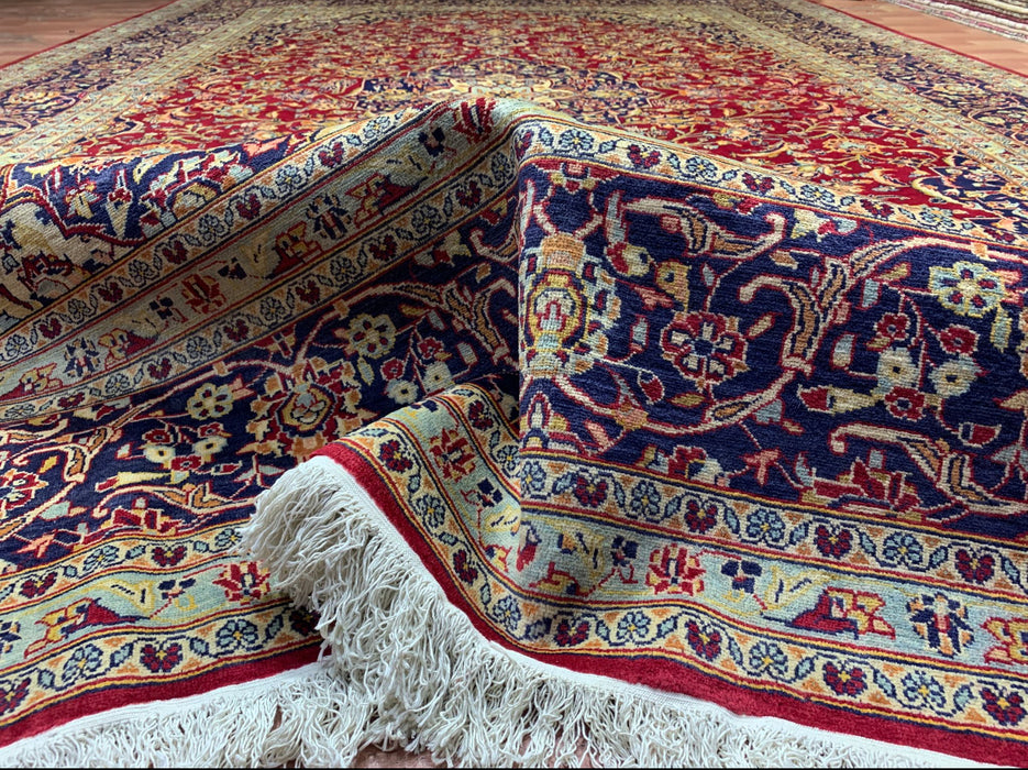 9’6” × 13’10” Hand-Knotted Persian Wool Rug – Red Field with Navy & Ivory Floral Border