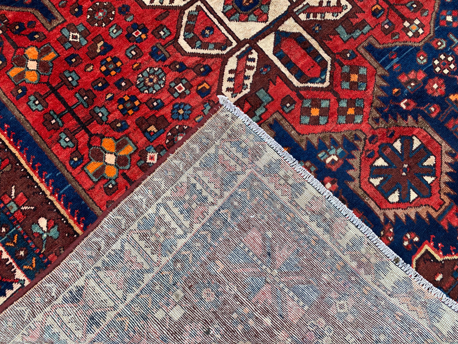 Handmade Persian Wool Area Rug 7x10 - Red Geometric Medallion Persian Style Rug with Navy Field - Exact Size 10'0" x 6'11" - KBHM-828
