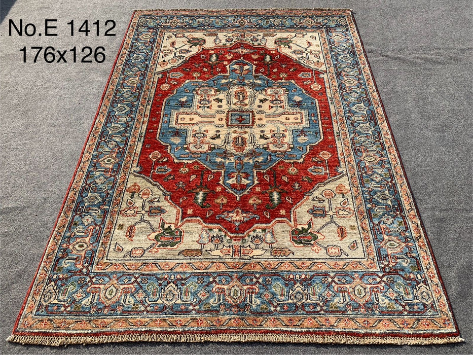4’2” x 5’9” Hand-Knotted Heriz Rug