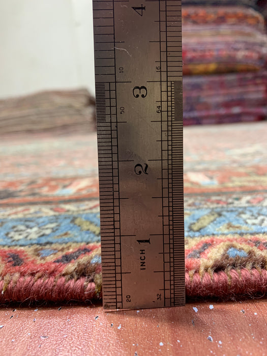 6’5” × 9’4” Hand-Knotted Wool Rug – Rust Red with Teal Diamond Medallion & Animal Border