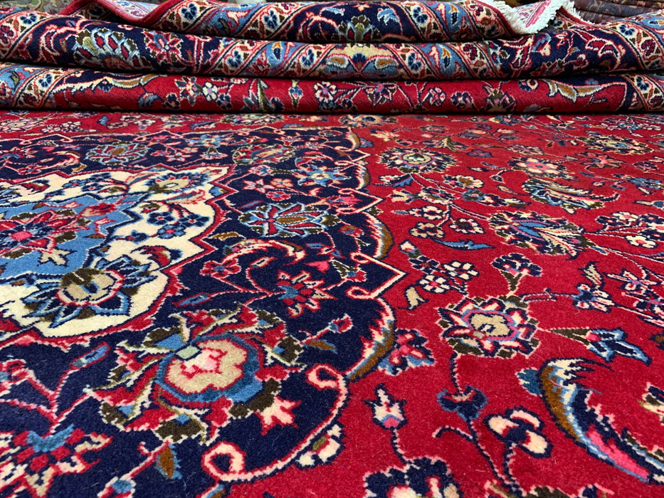 9’6” × 13’11” Hand-Knotted Wool Persian Rug – Red with Navy Border & Central Medallion