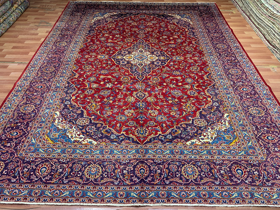 9’8” × 12’11” Hand-Knotted Wool Rug – Red with Navy & Light Blue Floral Medallion Design