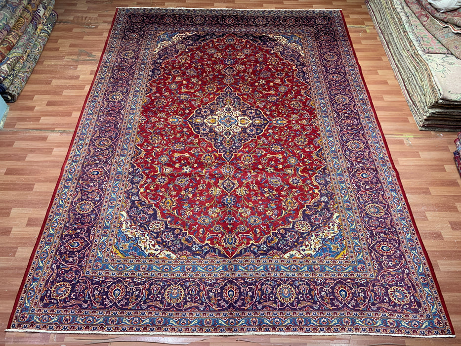 9’8” × 12’11” Hand-Knotted Wool Rug – Red with Navy & Light Blue Floral Medallion Design