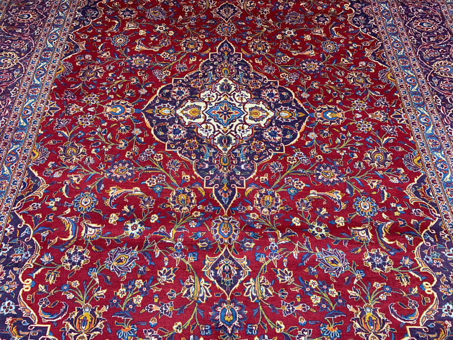 9’8” × 12’11” Hand-Knotted Wool Rug – Red with Navy & Light Blue Floral Medallion Design