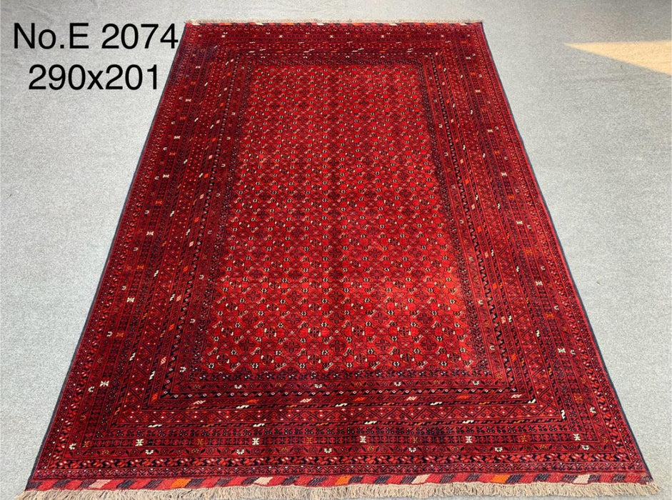 6’7” x 9’6” Hand-Knotted Bokhara Wool Rug – Deep Red with Repeating Gul Motifs