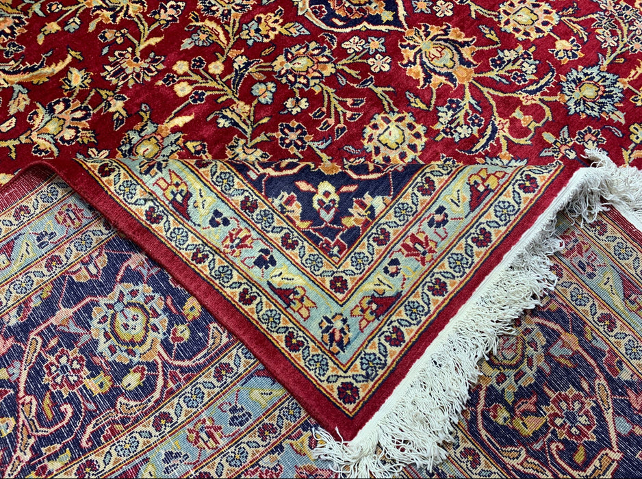 9’6” × 13’10” Hand-Knotted Persian Wool Rug – Red Field with Navy & Ivory Floral Border